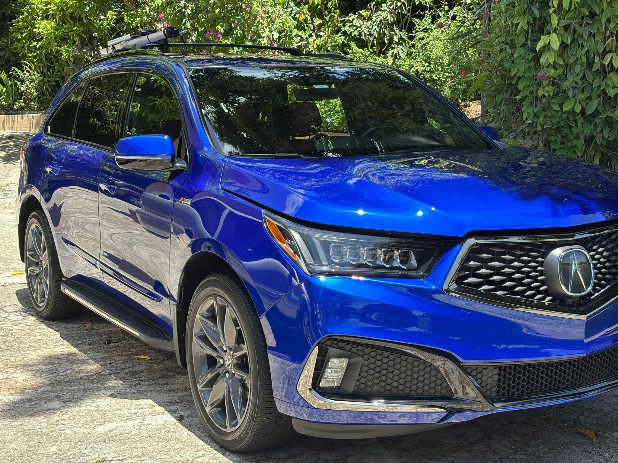 Acura MDX azul tras detailing completo